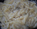 Four cheeses pasta with marjoram