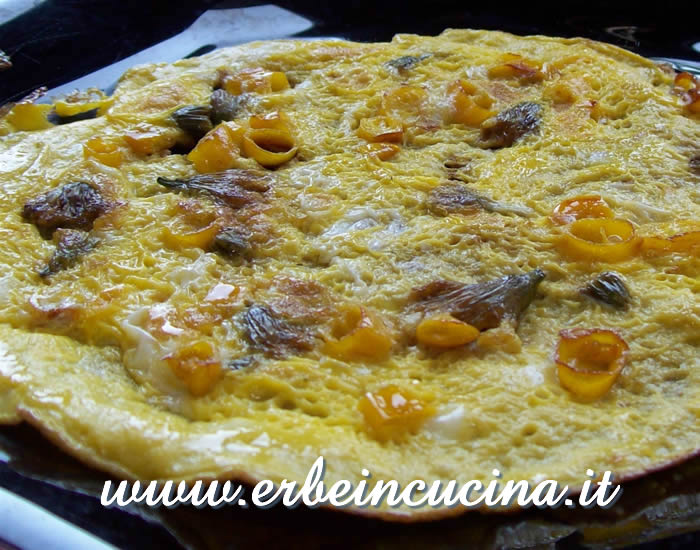 Yellow chilies omelette with dandelion