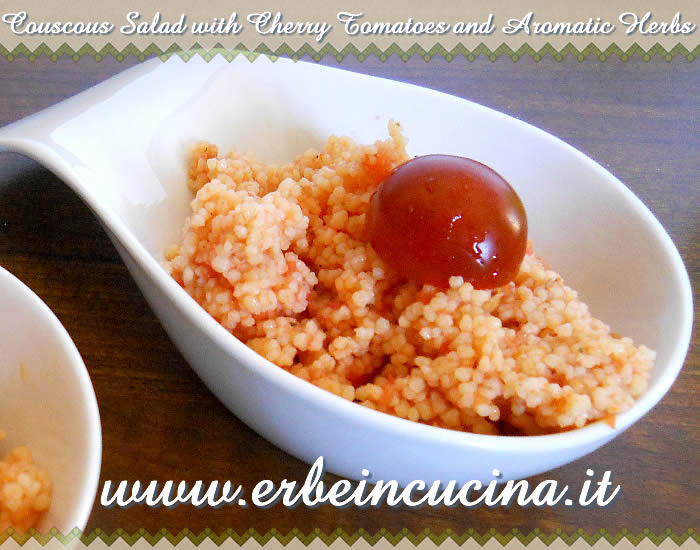 Couscous salad with cherry tomatoes and aromatic herbss